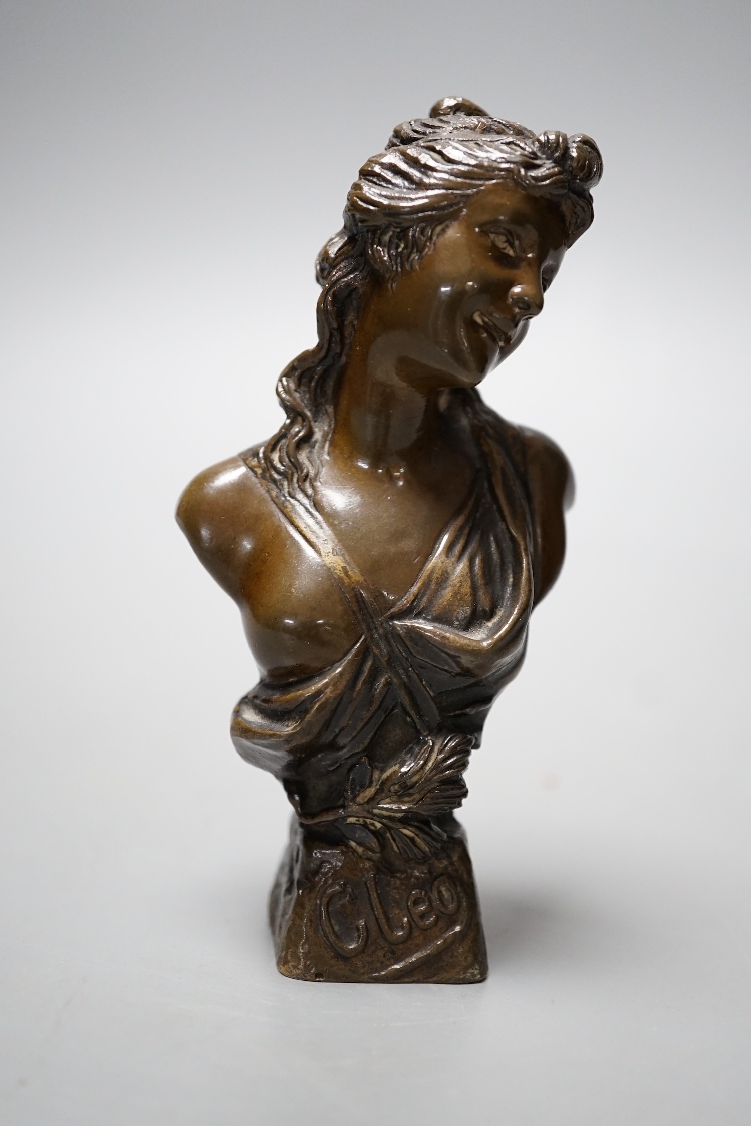 A small bronze bust marked ‘Cleo’, 11cm tall